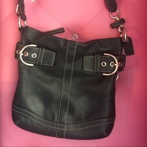 This is a super cute COACH purse!😍😍😍